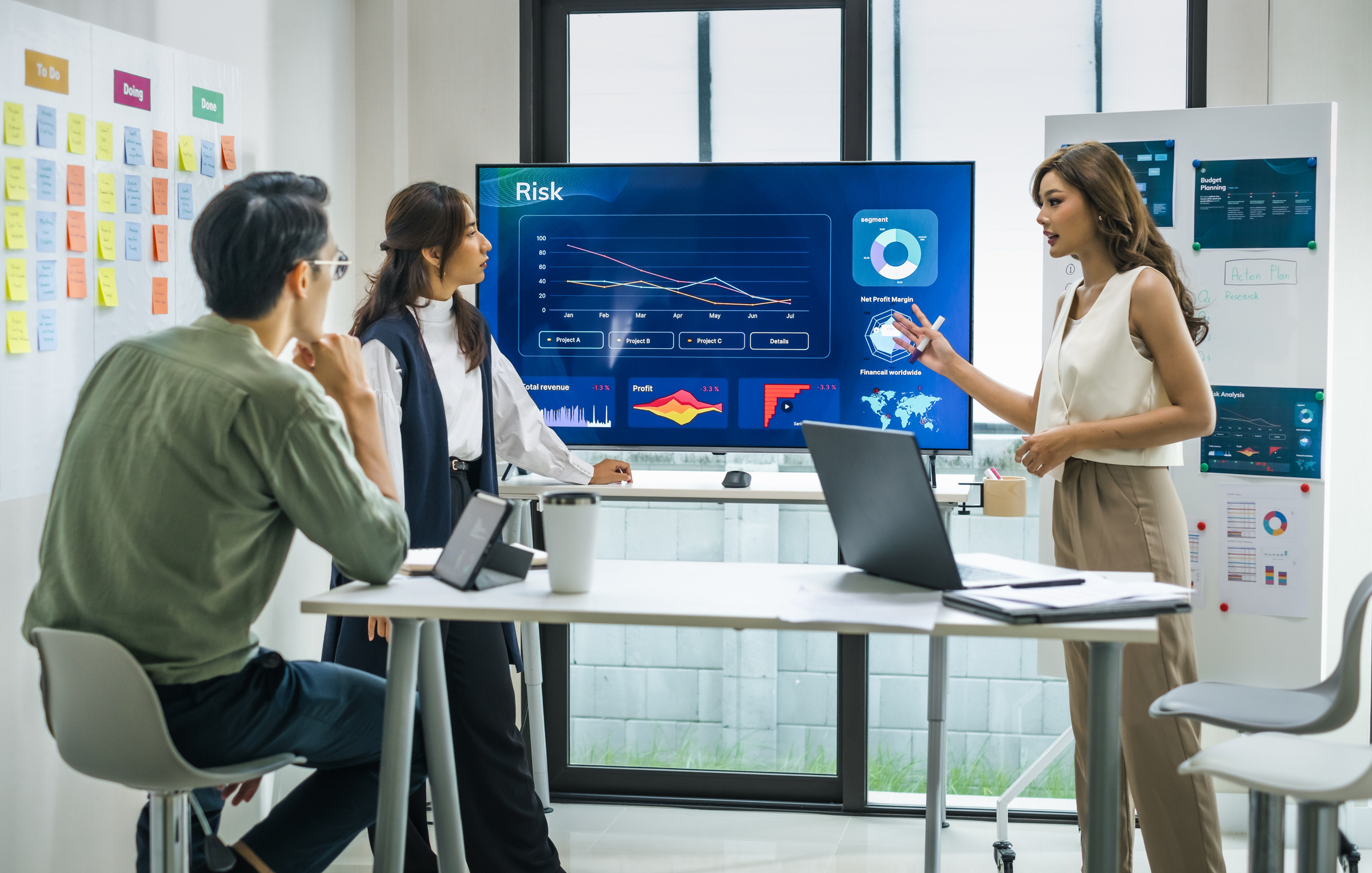 Team discussing data in a modern office.