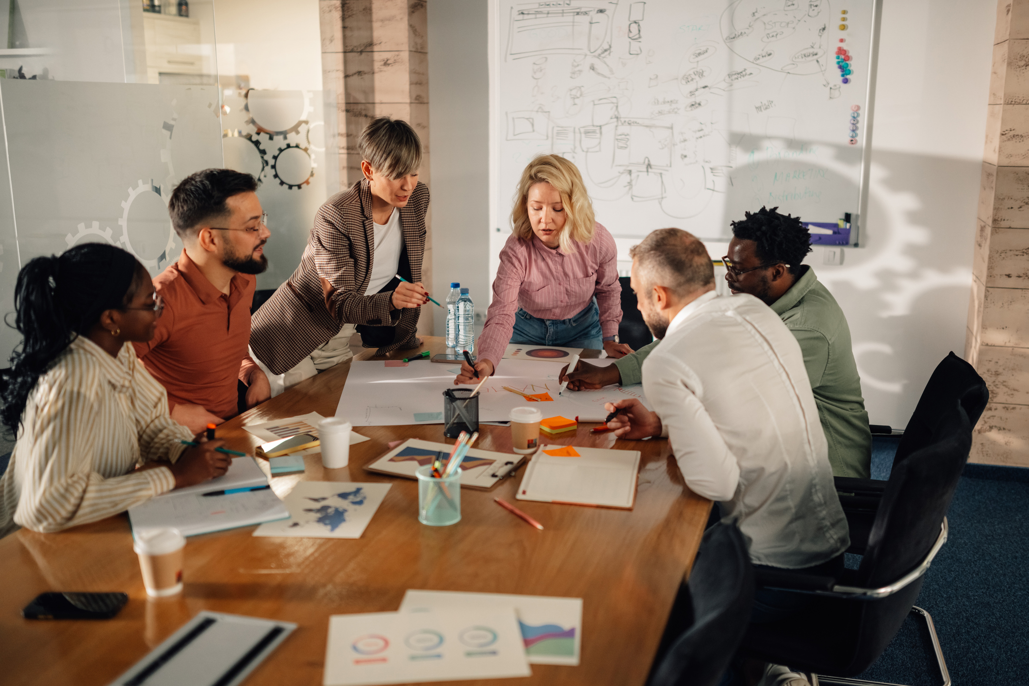 Team collaborating at a conference table.